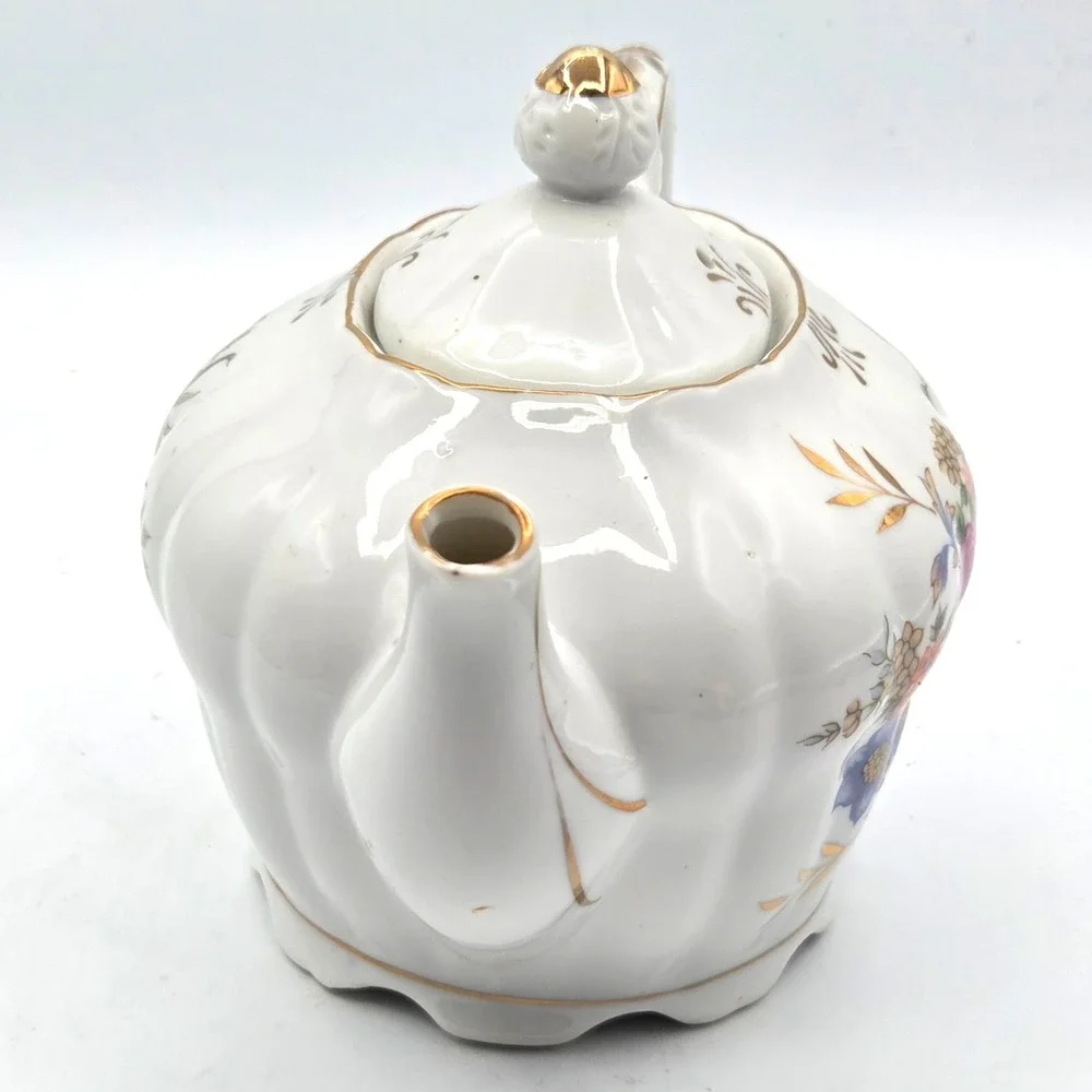 Porcelain Musical Teapot Plays 